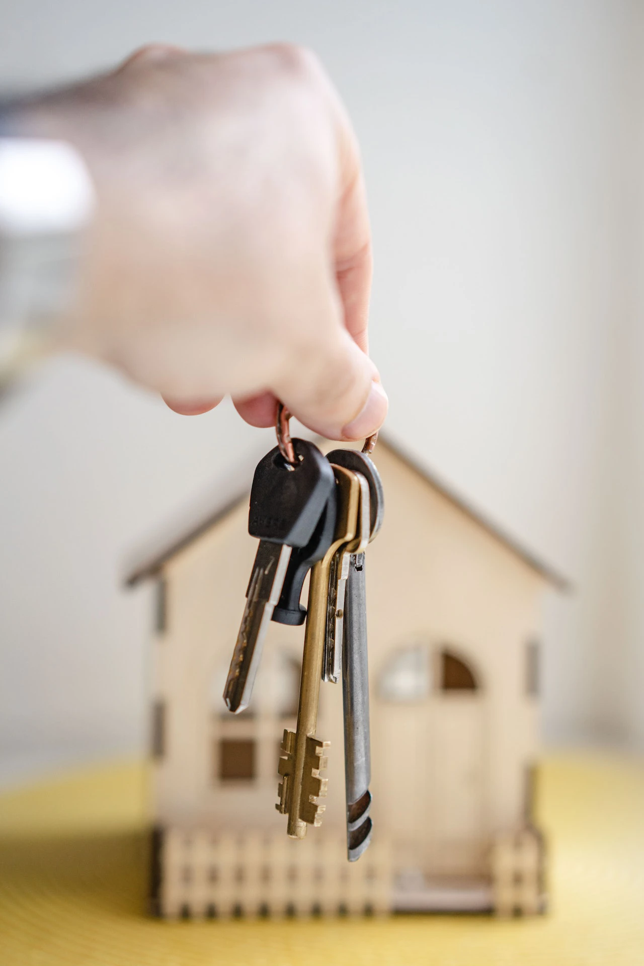 Person with keys for real estate